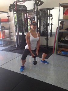 PLIE SQUAT WITH DUMBBELL
